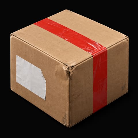 A dented, returned cardboard parcel sealed with red tape and a torn blank label