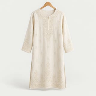A cream embroidered cotton kurta on a hanger