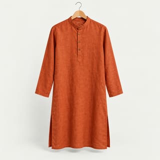 A rust orange linen kurta on a hanger